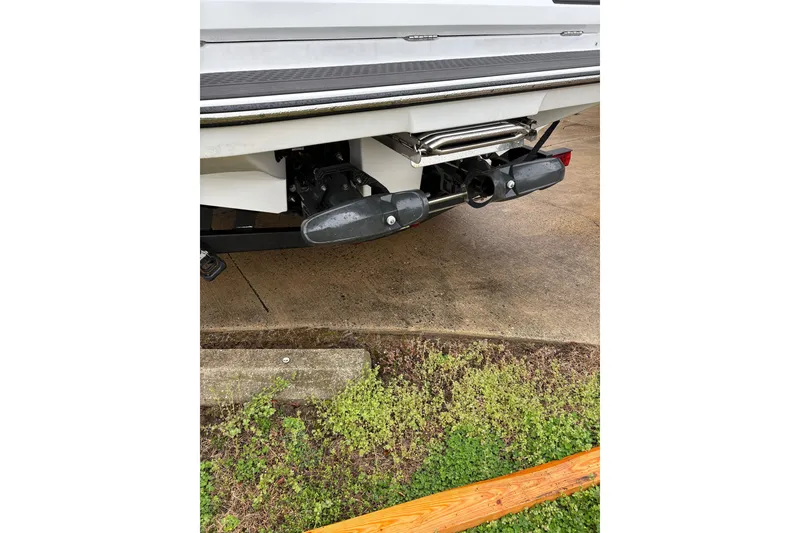 Slide: The Image of Rear view of a 2024 Scarab 235 ID boat on a trailer. - 3
