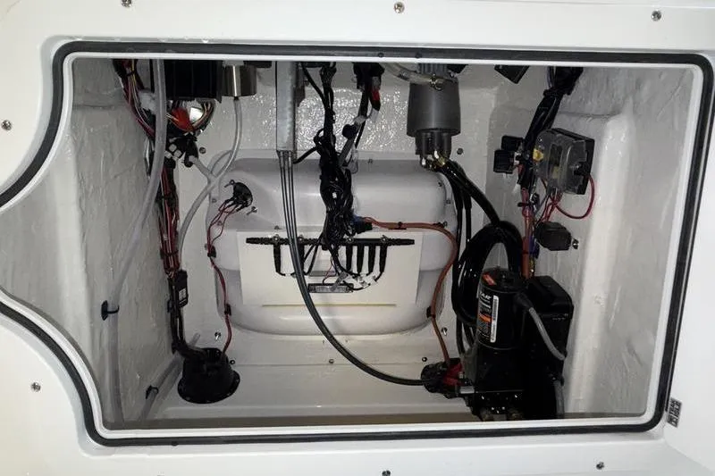 Slide: The Image of 2026 Sea Pro 230 Bay boat wiring and mechanical compartment. - 18