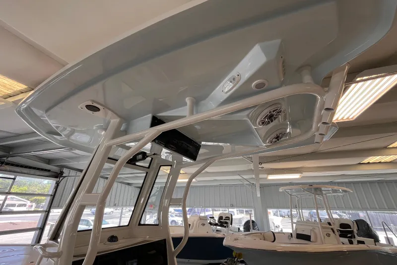 Slide: The Image of 2026 Tidewater 2500 Carolina Bay boat interior with modern features and sleek design. - 14