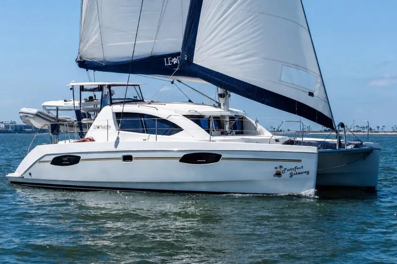 The Image of Sailing catamaran Leopard 39, 2011 model, cruising on calm waters under clear skies. - 0