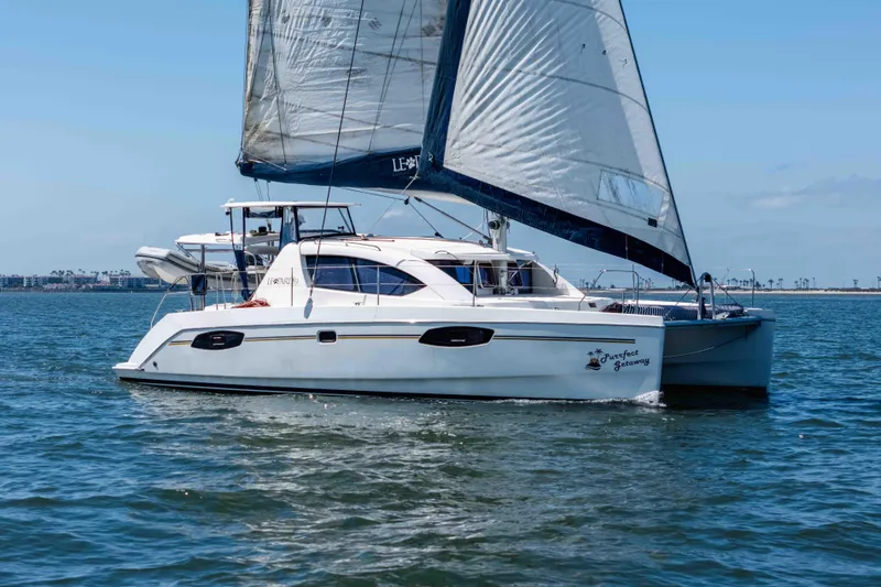 The Image of Sailing catamaran Leopard 39, 2011 model, cruising on open water under clear skies. - 1