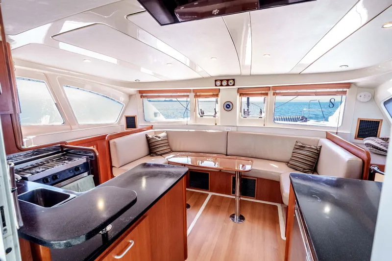 Slide: The Image of Luxurious interior of 2011 Leopard 39 yacht with modern kitchen and spacious seating area. - 10