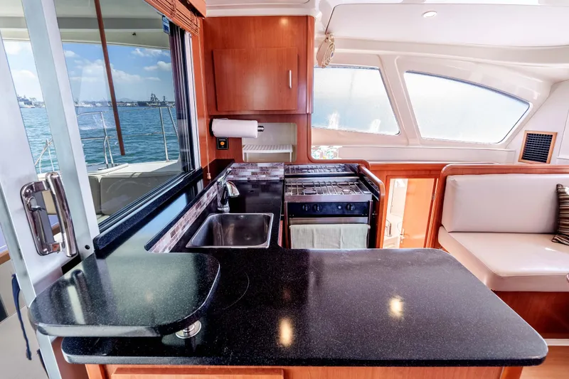 Slide: The Image of Luxurious kitchen interior of 2011 Leopard 39 yacht with ocean view. - 12