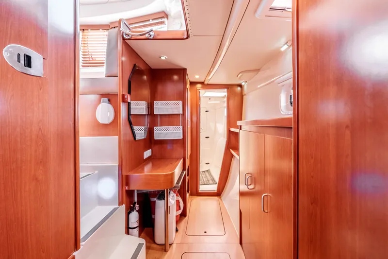 Slide: The Image of Interior of 2011 Leopard 39 yacht with wooden cabinetry and modern design. - 18