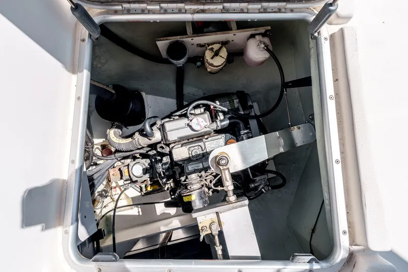 Slide: The Image of Engine compartment of a 2011 Leopard 39 catamaran, showcasing mechanical components and wiring. - 28