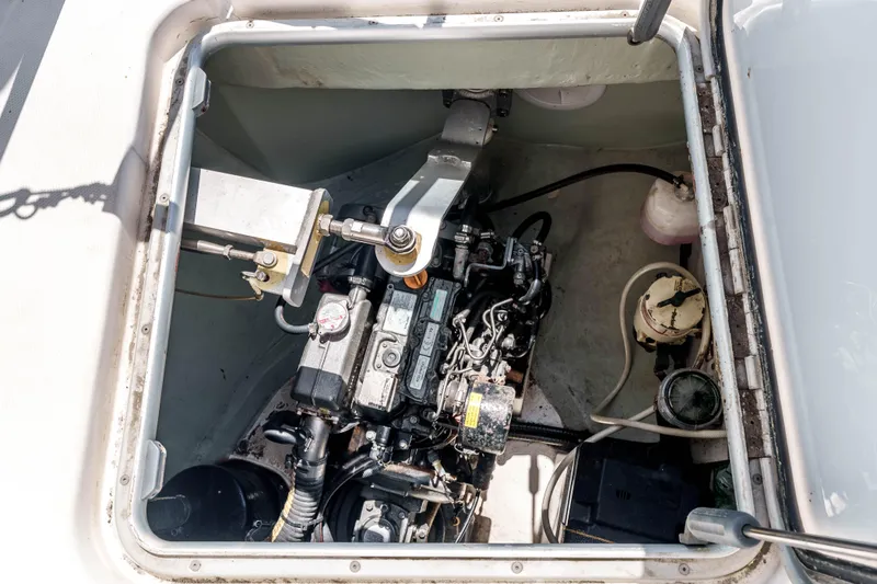 Slide: The Image of Engine compartment of a 2011 Leopard 39 yacht, showcasing mechanical components and equipment. - 29