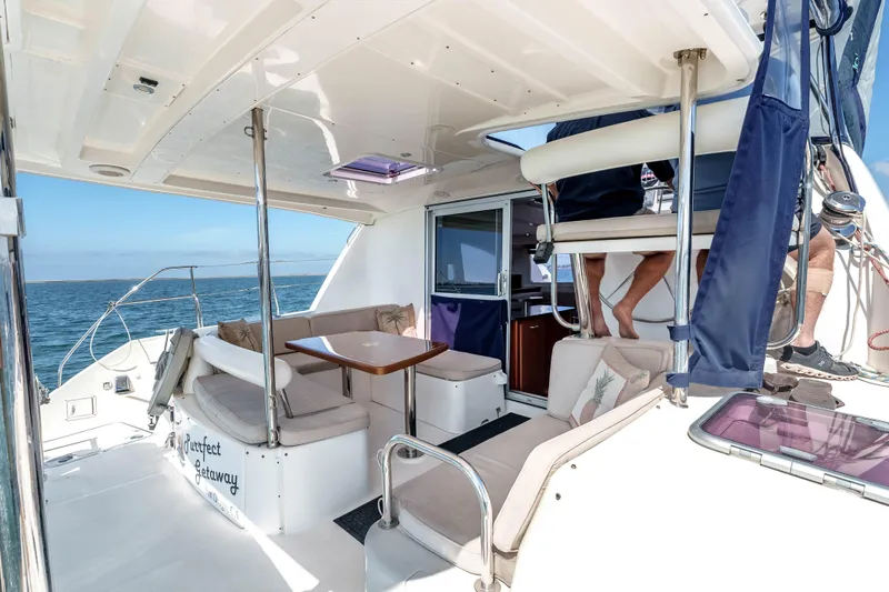 Slide: The Image of Luxurious 2011 Leopard 39 yacht interior with seating area and ocean view. - 3