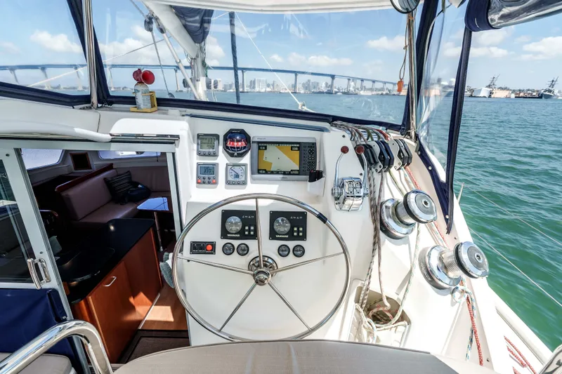 Slide: The Image of Helm of 2011 Leopard 39 yacht with navigation instruments and ocean view. - 8