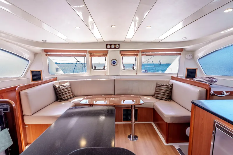 Slide: The Image of Luxurious interior of 2011 Leopard 39 yacht with elegant seating and panoramic windows. - 9