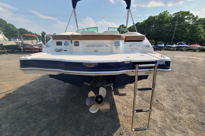 Slide: The Image of 2014 Chaparral 246 SSi boat rear view with ladder and propeller. - 4