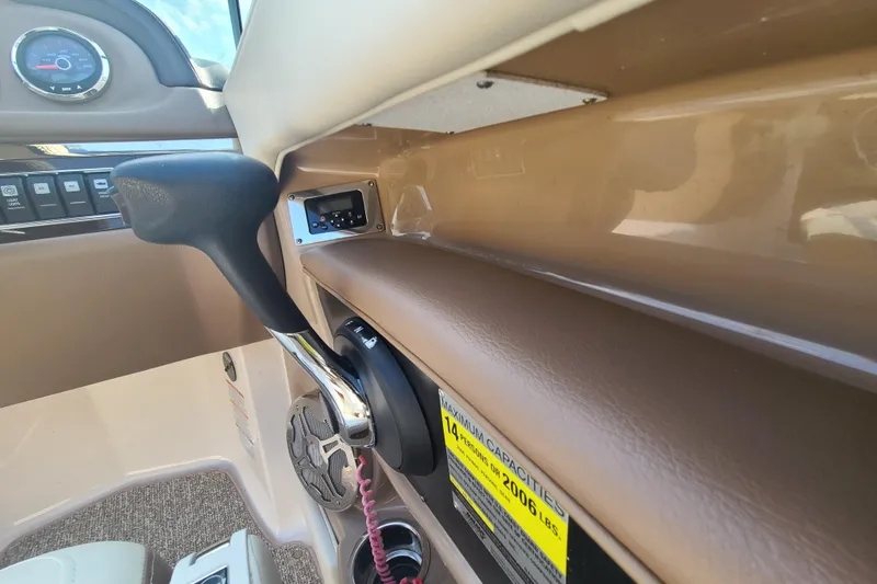 Slide: The Image of Interior view of 2014 Chaparral 246 SSi boat dashboard and controls. - 40