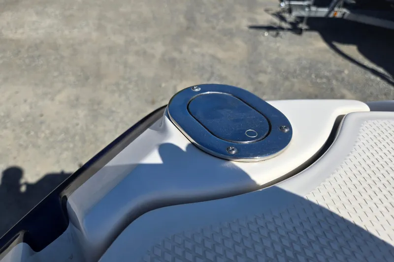 Slide: The Image of Close-up of a 2014 Chaparral 246 SSi boat deck detail with metal fixture. - 50