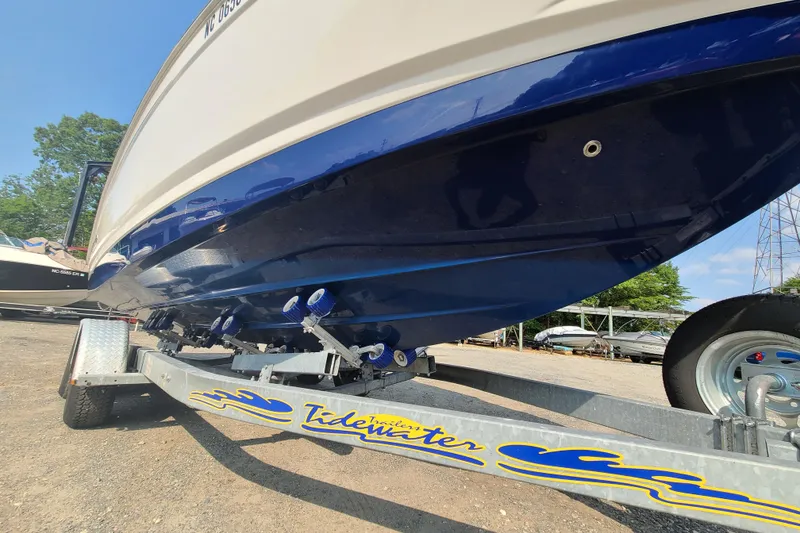 Slide: The Image of 2014 Chaparral 246 SSi boat on Tidewater trailer, parked outdoors. - 7