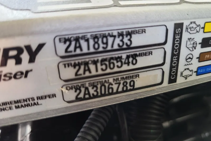 Slide: The Image of Close-up of serial numbers on a 2014 Chaparral 246 SSi engine component. - 74