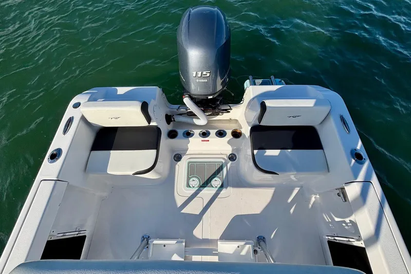 Slide: The Image of 2024 Tidewater 180 CC Adventure boat interior with Yamaha 115 engine on water. - 17