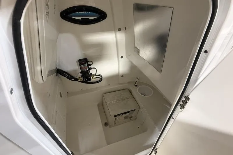 Slide: The Image of Interior of 2026 Sea Pro 242 Center Console boat storage compartment. - 20