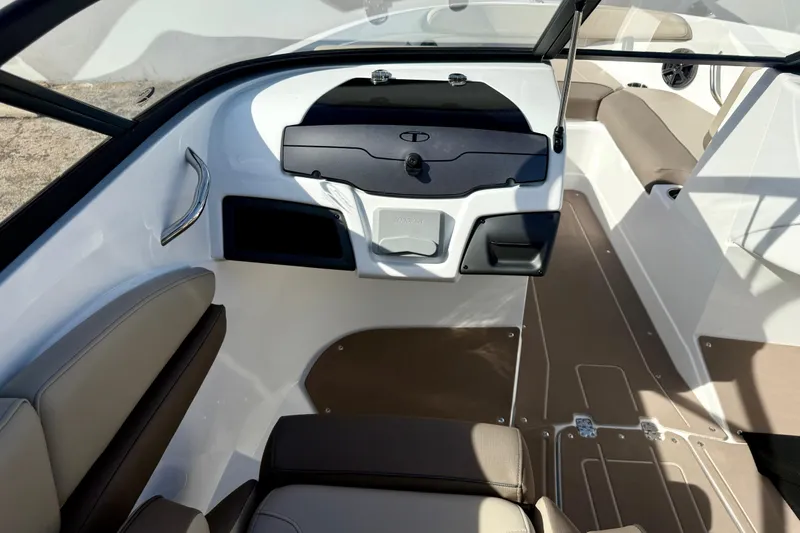 Slide: The Image of Interior view of 2026 Tahoe 210 S boat, featuring sleek seating and modern design. - 25