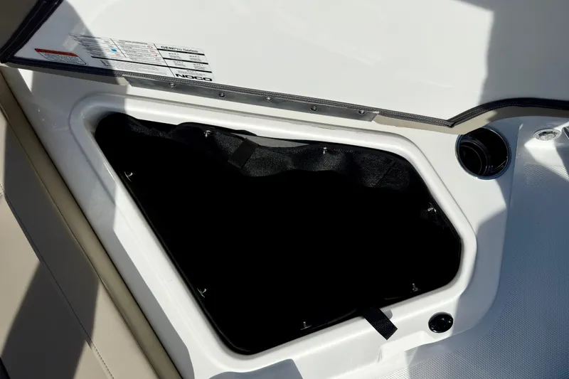 Slide: The Image of Storage compartment in 2026 Tahoe 210 S boat, featuring sleek design and ample space. - 35