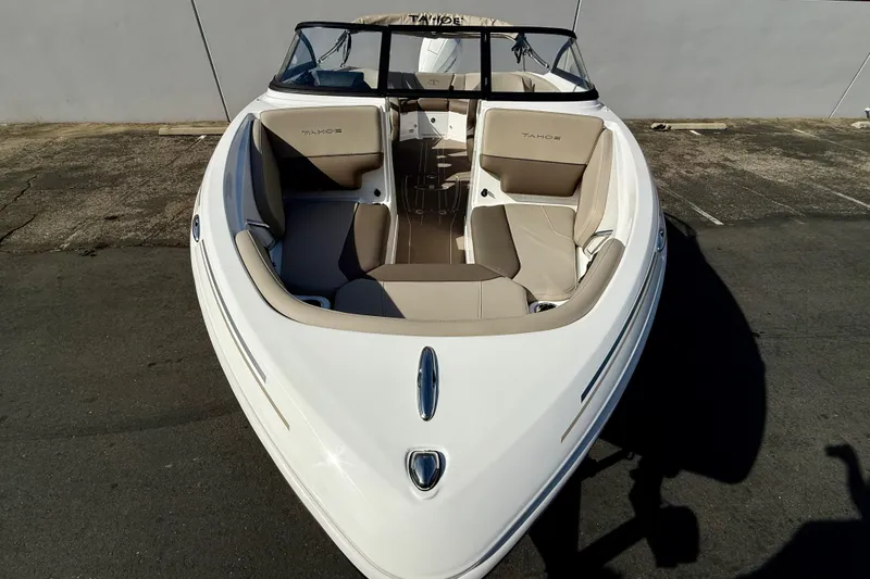 Slide: The Image of 2026 Tahoe 210 S boat with sleek design and spacious seating. - 4
