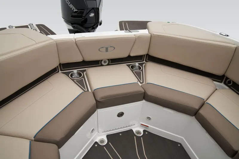 Slide: The Image of Manufacturer Provided Image: 2025 Tahoe 210 S boat interior with beige seating and cup holders. - 7