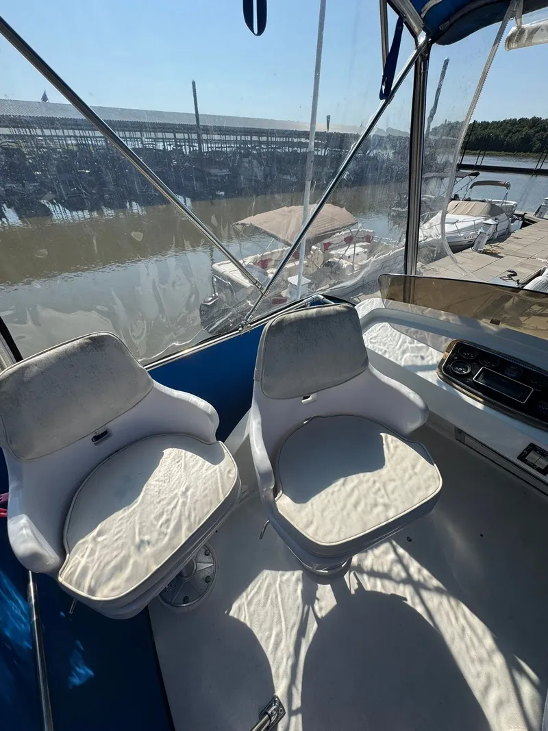 Slide: The Image of Interior view of 1968 Hatteras 31 Flybridge with two seats. - 11