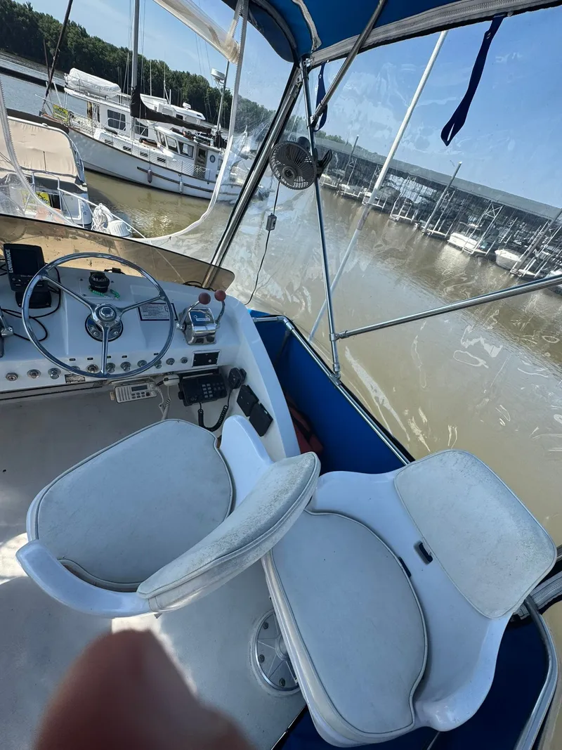 Slide: The Image of Interior of 1968 Hatteras 31 Flybridge at marina. - 12