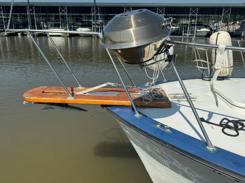 Slide: The Image of 1968 Hatteras 31 Flybridge with grill on bow deck. - 2
