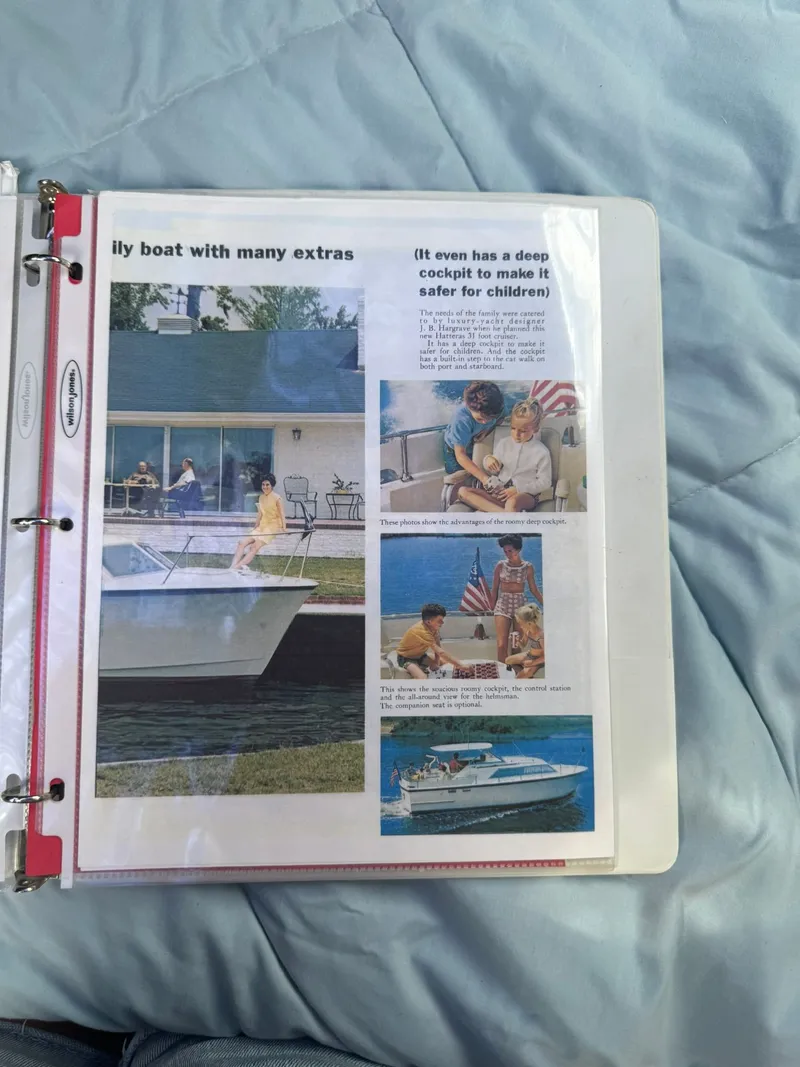 Slide: The Image of 1968 Hatteras 31 Flybridge brochure with family photos. - 26
