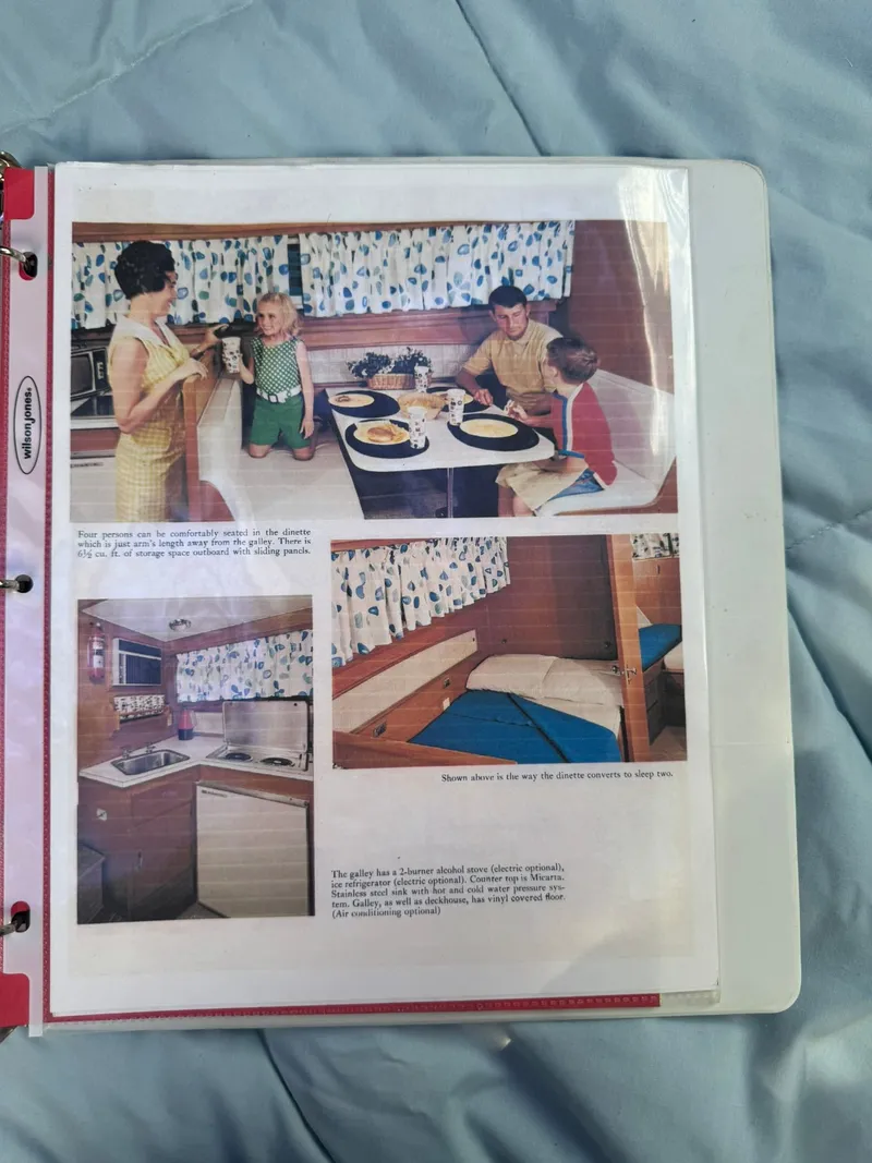 Slide: The Image of Interior of 1968 Hatteras 31 Flybridge with dining area and kitchen. - 28