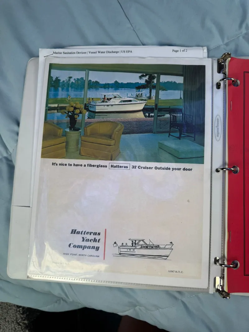 Slide: The Image of Advertisement for 1968 Hatteras 31 Flybridge yacht. - 29