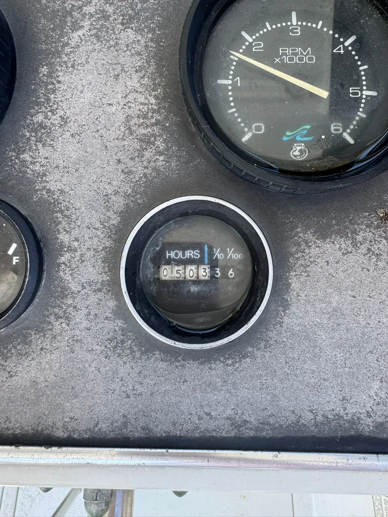 Slide: The Image of Hatteras 31 Flybridge 1968 hour meter showing 503.6 hours. - 31