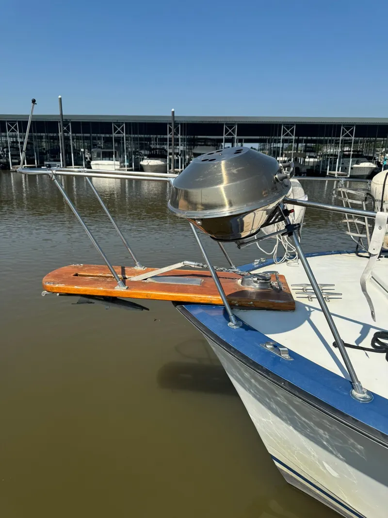 Slide: The Image of 1968 Hatteras 31 Flybridge with stainless steel grill on bow. - 5