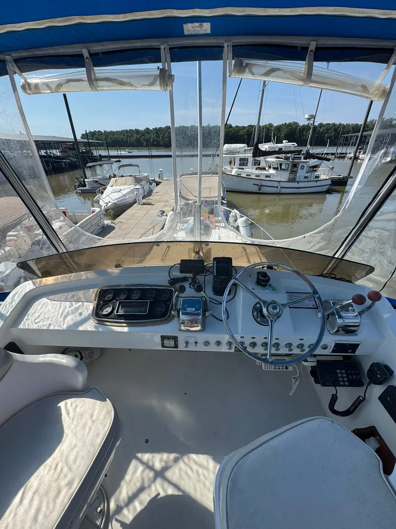 Slide: The Image of Interior view of 1968 Hatteras 31 Flybridge at dock. - 9