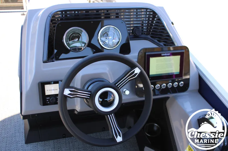Slide: The Image of Dashboard of 2026 Barletta ARIA 22UC with steering wheel and Simrad display. - 14
