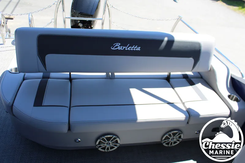 Slide: The Image of Barletta ARIA 22UC 2026 boat seat with gray upholstery and speakers. - 16