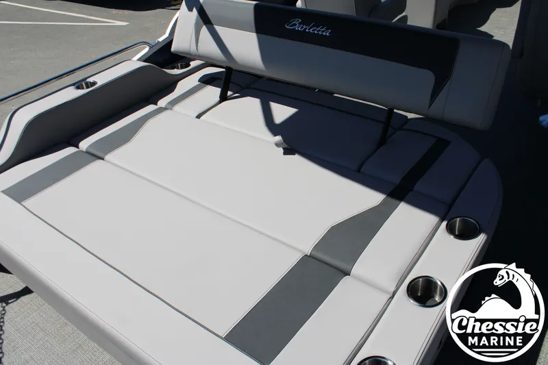 Slide: The Image of 2026 Barletta ARIA 22UC boat with gray upholstery and cup holders. - 17