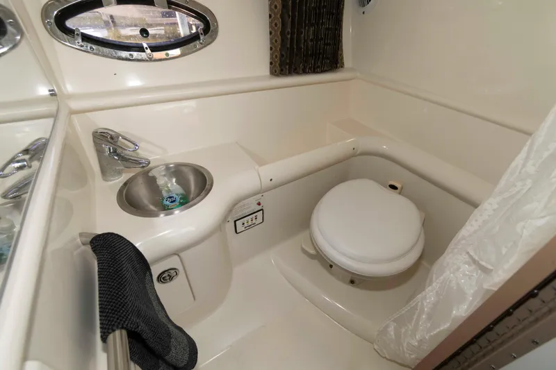 Slide: The Image of 2004 Formula 330 Sun Sport boat bathroom with sink and toilet. - 20
