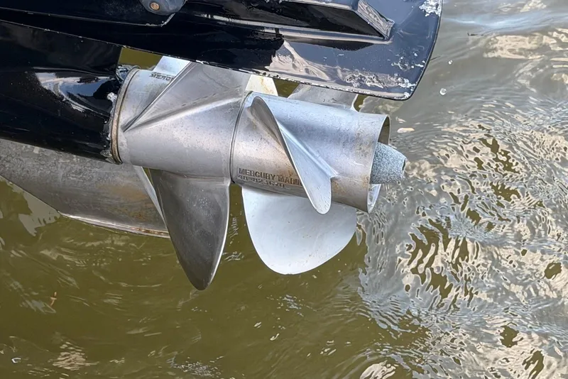 Slide: The Image of Close-up of a 2004 Formula 330 Sun Sport boat propeller in water. - 23