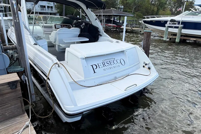 Slide: The Image of 2004 Formula 330 Sun Sport boat docked, named "PERSECCO" on Severn River. - 4