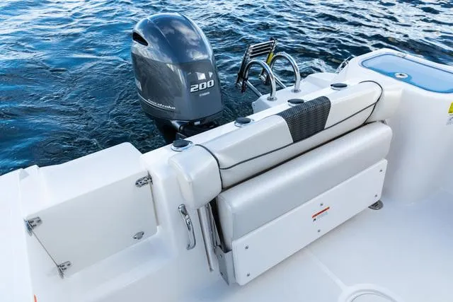 Slide: The Image of 2023 Wellcraft 222 Fisherman boat with Yamaha 200 outboard motor. - 6