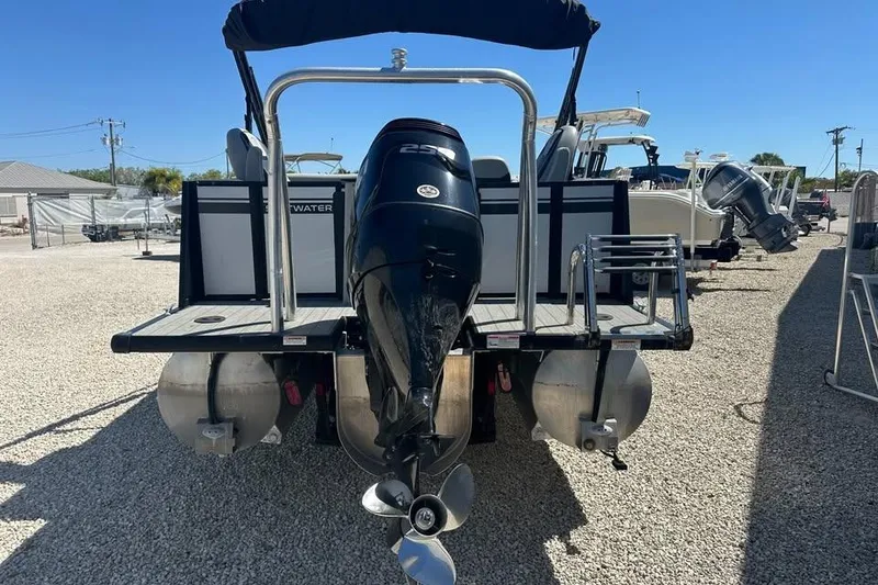 Slide: The Image of 2023 Viaggio Lago X-R 22 boat with powerful outboard motor in a sunny marina. - 4