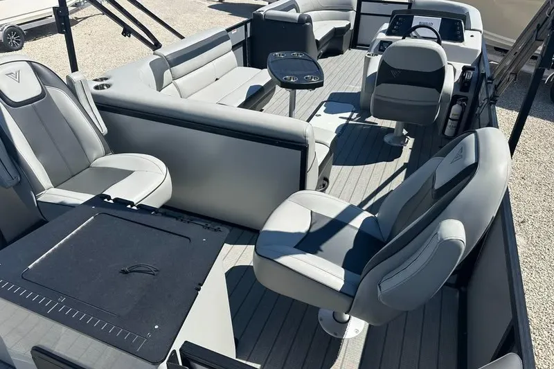 Slide: The Image of 2023 Viaggio Lago X-R 22 boat interior with modern seating and steering console. - 6