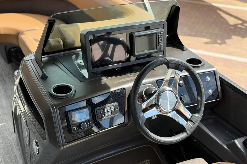 Slide: The Image of Steering console of 2026 Bennington 24 M Fish and Cruise boat with modern controls. - 11