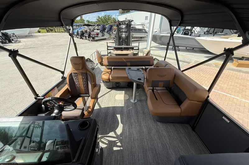 Slide: The Image of Interior of 2026 Bennington 24 M Fish and Cruise pontoon boat with luxurious seating. - 14