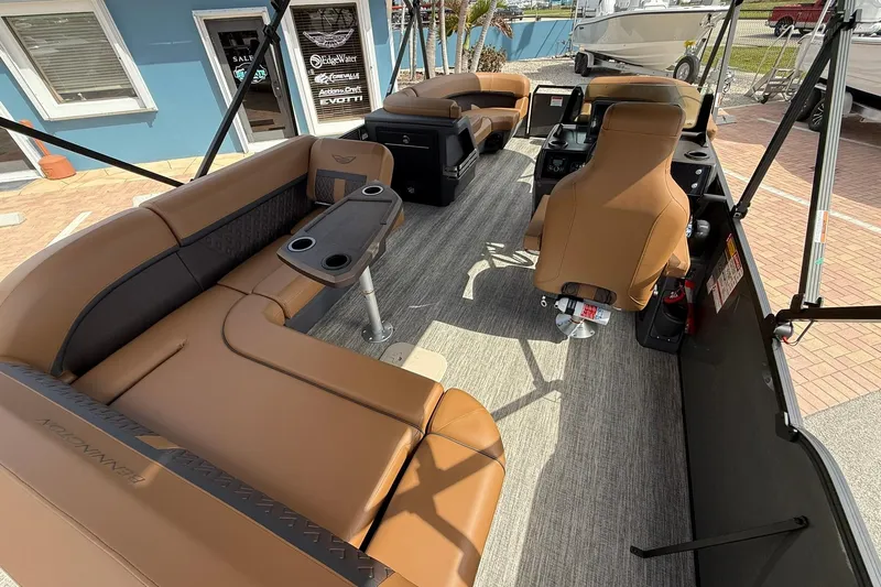 Slide: The Image of 2026 Bennington 24 M Fish and Cruise boat interior with luxurious seating and modern design. - 8