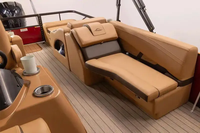 Slide: The Image of Manufacturer Provided Image: Luxurious interior of 2026 SunCatcher Fusion 324SS boat with tan seating and cup holders. - 2