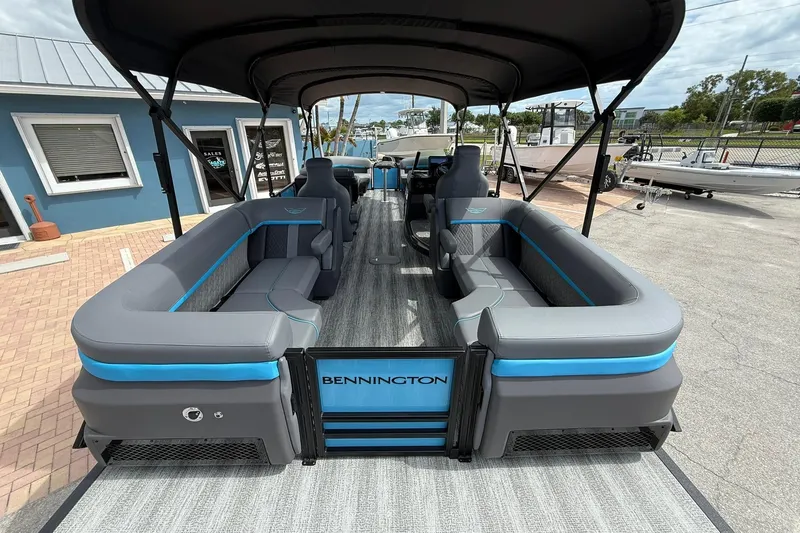 Slide: The Image of 2026 Bennington 26 M Quad Bench pontoon boat with spacious seating and modern design. - 3