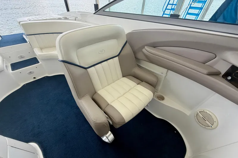Slide: The Image of Luxury seating on a 2003 Cobalt 282 boat with blue and white upholstery. - 16