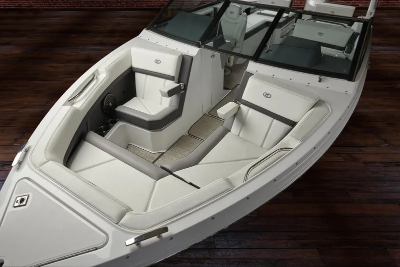 Slide: The Image of 2026 Cobalt R6 Outboard boat interior with modern dashboard and white captain's chair. - 20