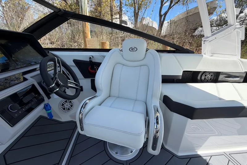 Slide: The Image of 2026 Cobalt R6 Outboard boat interior with luxurious white seating and sleek design. - 29
